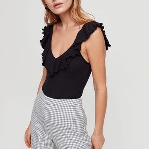 black ruffled top bodysuit